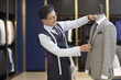 © Blue Jean Images - Confident fashion designer working