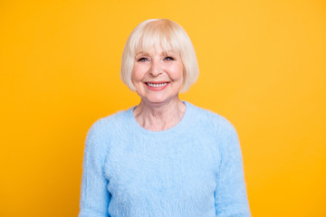 Wall Mural - Beautiful and happy blond hair grandma looking at camera isolate