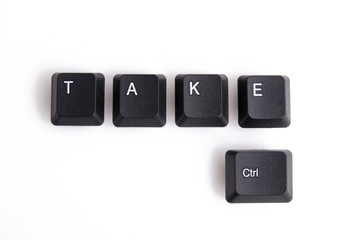 key board letters isolated on a white background spelling take control