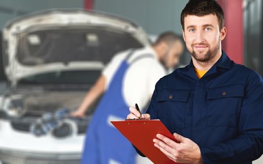 Wall Mural - Delivery man with clipboard on light background