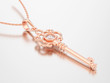 3D illustration red rose gold decorative key necklace on chain with diamond
