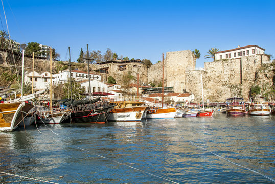 Antalya, Turkey, 17 December 2010: Antalya Marina with Sailboats and Castle of Antalya
