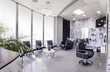 Panorama of a  modern bright beauty salon. Hair salon interior business with black and white luxury decor.