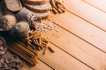 Frame with best know Whole-grain foods on a wooden table