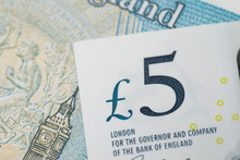 Close-up Of 5 Pound Sterling England Currency Banknotes, Brexit, UK Economics, Saving, Financial Or Investment With Europe, Business Profit And Loss Concept