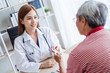 © Nattakorn - Asian doctor woman explaining old patient for taking medicine, asian medical concept