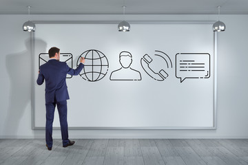 Fototapete - Businessman drawing thin line contact icon