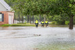 © michelmond - The first responders inspect flooded houses in flooded residential area. Hurricane Harvey caused many flooded areas in Houston and its suburbs