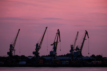  Wharf Cranes In Front Of Sunset Sky