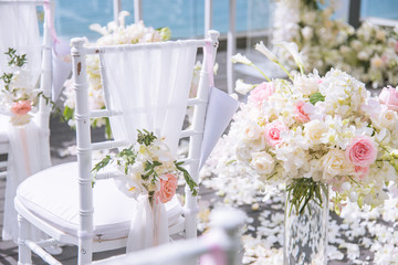 Wall Mural - Chair decorated with flowers in Wedding ceremony.