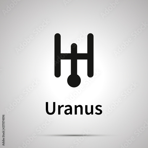 Fotografie, Obraz Uranus astronomical sign, simple black icon with shadow on gray