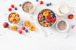 healthy granola for breakfast with berry fruit nut, vegan milk