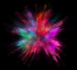 Wall Mural - Coloured powder explosion isolated on black background