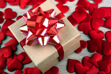 Wall Mural - gift boxes on the background of textile forms of hearts