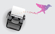 typewriter with letters fly like a birds