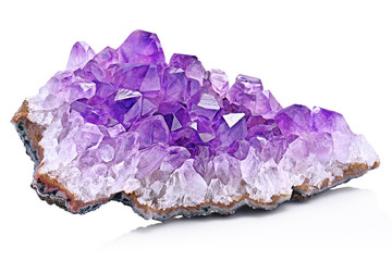 violet crystal stone macro mineral. purple rough amethyst quartz crystals geode on white background,