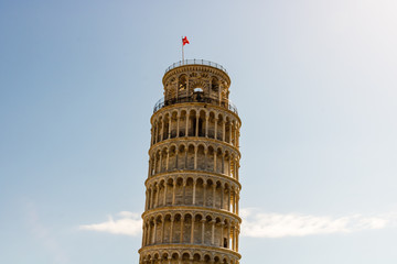 Leaning Tower of Pisa, Tuscany, Italy, Europe. Tower of Pisa Over Blue Sky. Italian Architecture.