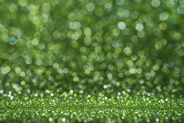 Poster - Abstract light green sparkling glitter wall and floor perspective background studio with blur bokeh.luxury holiday backdrop mock up for display of product.holiday festive greeting card.