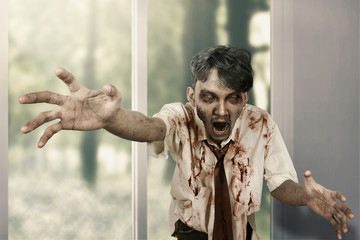 Canvas Print - Scary zombie man haunted a house