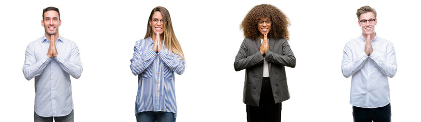 Wall Mural - Team of business men and women praying with hands together asking for forgiveness smiling confident.