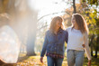 © Martinan - Women in park taking a walk together