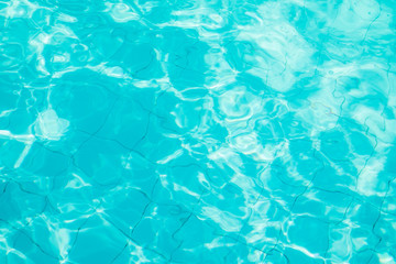 Water swimming pool. pool with blue water. Background of clean blue rippled water in a hotel swimming pool