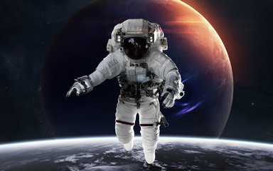 Wall Mural - neptune with astronaut in front of planet. solar system. elements of this image furnished by nasa