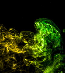 Colored smoke on black background