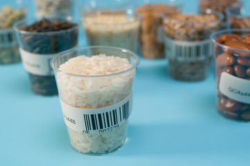 Canvas Print - seeds of agricultural plants in test tube with barcodes in the laboratory