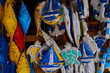 © eskstock - Souvenir background. Travel and tourism concept. Hanging handicraft decoration wooden carved toys. Art and craft market. Display of handicraft decoration in the open market. Selective focus