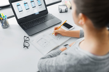 Wall Mural - app design, technology and business concept - web designer or developer working on user interface an