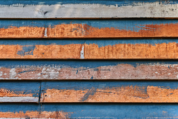 Wall Mural - Empty blue wooden background. Vintage surface. Old grunge blue wooden board.  Rustic style. Natural texture background with natural patterns. Shabby wooden boards with old blue paint.