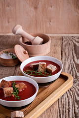 Wall Mural - Tomato soup  with rye bread croutons and thyme