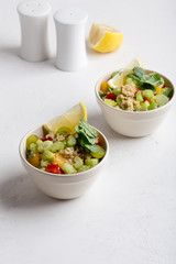 Wall Mural - Quinoa salad with vegetables celery, bell pepper, tomatoes and grapes