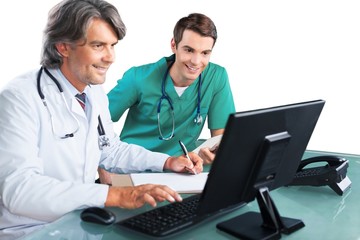 Sticker - Portrait of Two Doctors Looking at a Computer Monitor