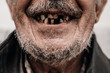 © Parilov - Old man without part of his teeth is smiling