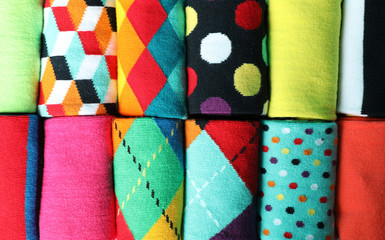 Wall Mural - Different colorful socks as background, closeup