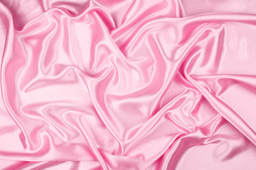 Pink luxury satin fabric texture for background