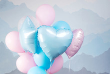 Blue And Pink Balloons In Studio. Close Up Picture