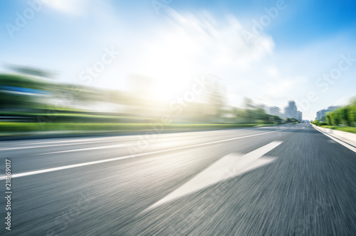Cuadros en Lienzo high speed view of asphalt road