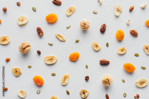 top-view-of-tasty-dried-fruits-and-nuts-isolated-on-white-background