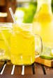 Mason jar glasses of homemade lemonade with slices of lemon