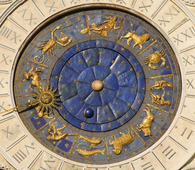 ancient time, astrology and horoscope. detail of saint mark square old clocktower with zodiac signs,
