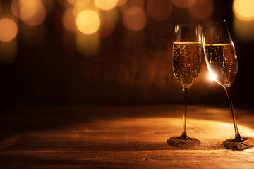 Golden christmas background with champagne