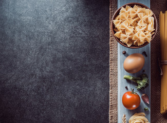 Canvas Print - pasta and food ingredient on table