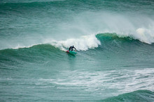 Surfer Carving The Waves, Fistral, Cornwall
