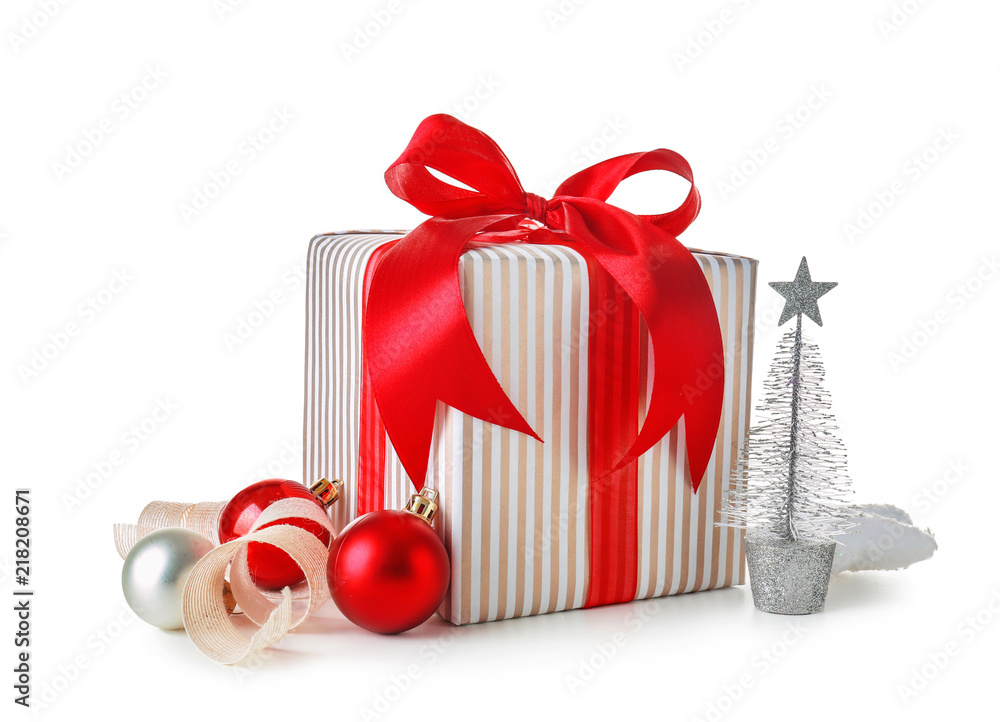 Christmas gift box and decorations on white background