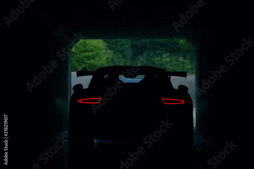 Fotomural Back view of supercar in tunnel