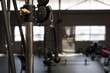 © Wavebreak Media - Triceps machine in fitness studio