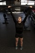 © Wavebreak Media - Woman exercising in fitness gym